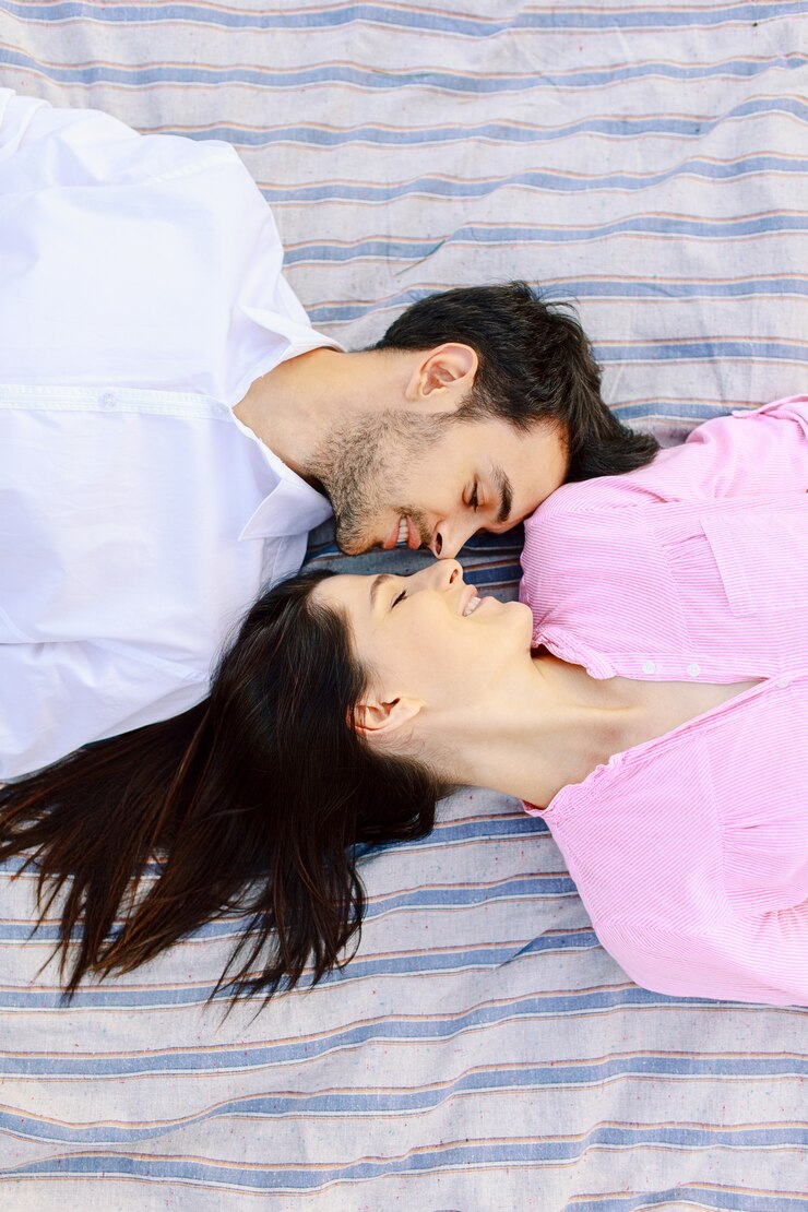 couple lying in close proximity to each other